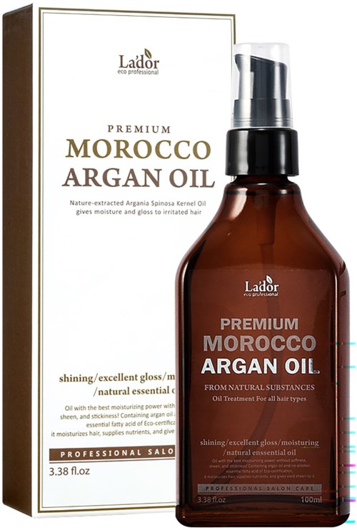 En brun flaske med Morocco Argan Oil med pumpe, ved siden av esken sin. Begge har tekstdetaljer.