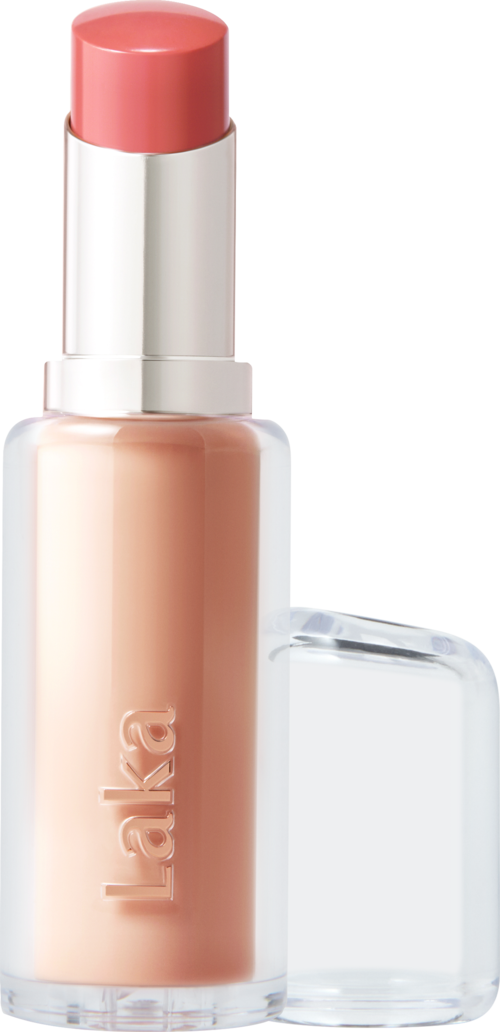 A bottle of light pink lipstick with a transparent cap and a clear base, labeled 'Laka'.