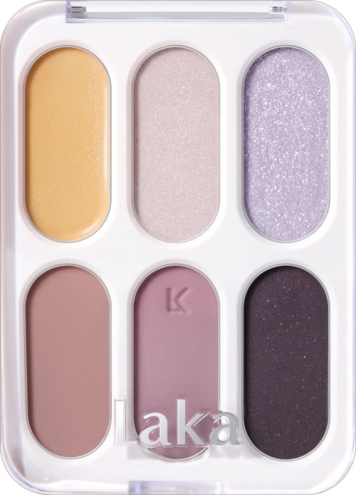 Zes oogschaduwkleuren in een palette: geel, lichtroze, lavendel, beige, mauve, donkerpaars.