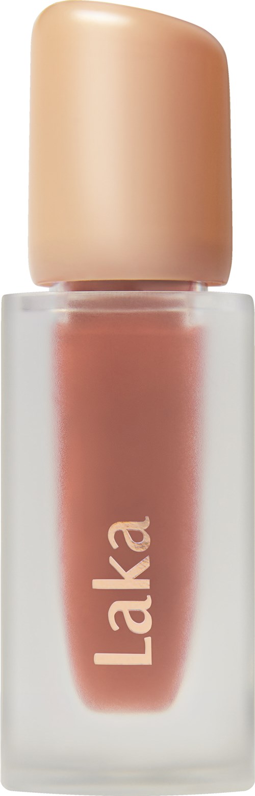 A small bottle of skin-colored nail polish with a beige cap and the word Laka on it.