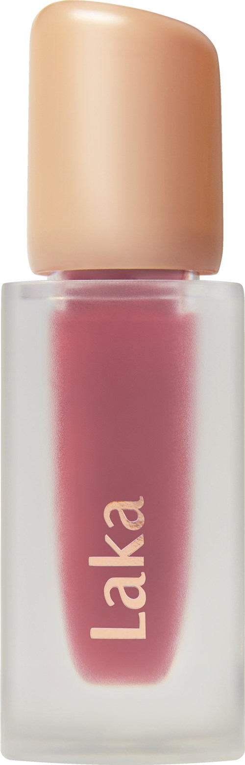 A nail polish bottle with a pink color and a beige cap, labeled 'Laka' on the front.