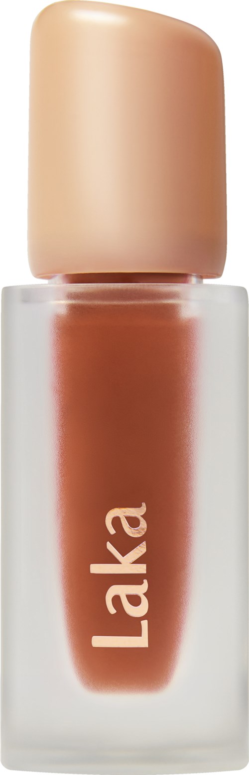 A lipstick bottle with beige cap and brownish liquid inside, labeled 'Laka' on the front.