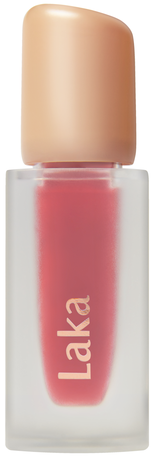 Lip gloss tube with a pinkish gloss inside and a beige cap. The brand name 'Laka' is written on it.