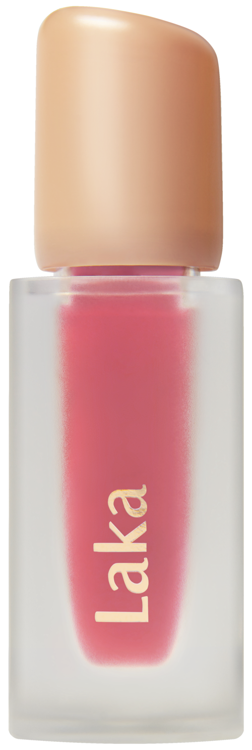 A small bottle with pink lipstick inside and a beige cap. The word "Laka" is written on the bottle.