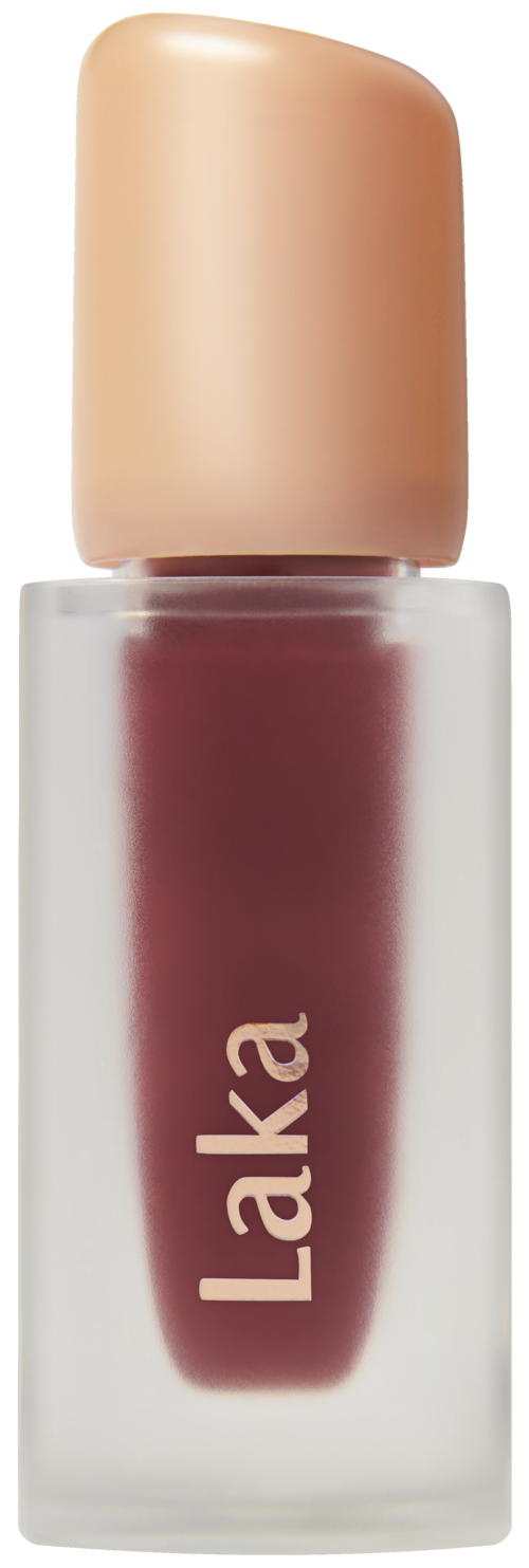 Lippenbalsem met beige dop, doorzichtige fles en merknaam 'Laka'.
