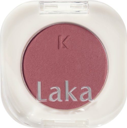 Pink blush in a white compact with a clear lid, labeled 'Laka'.