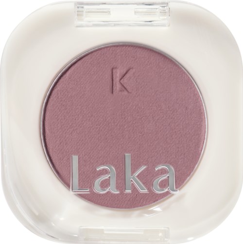 Pink blush in a white compact with a clear lid, marked with a 'K' and the word 'Laka'.