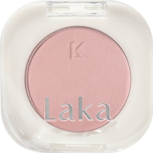 A pink blush in a white compact case, with a small letter 'K' and the word 'Laka' printed on it.