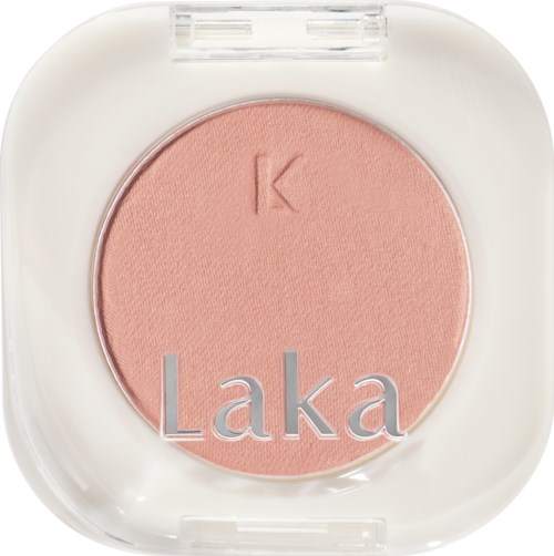 Pink blush with a 'K' embossed, brand name 'Laka' on package. Circular and soft in appearance.