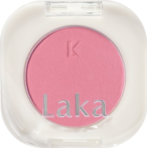 A pink blush compact with a white base and clear lid, featuring a letter 'K' and the brand name 'Laka' on it.