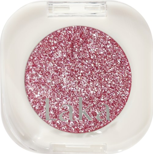 Shimmering pink eyeshadow in a round case with white border, labeled "Laka."
