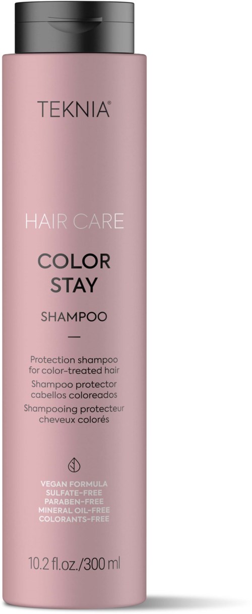 Pink bottle of Teknia Color Stay Shampoo, helps protect color-treated hair. It has a black cap.