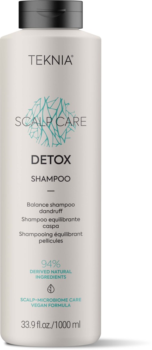 Weißes Shampoo-Flasche mit schwarzem Deckel, beschriftet 'TEKNIA SCALP CARE DETOX SHAMPOO', 94 % natürliche Inhaltsstoffe, für Kopfhaut und Schuppen.