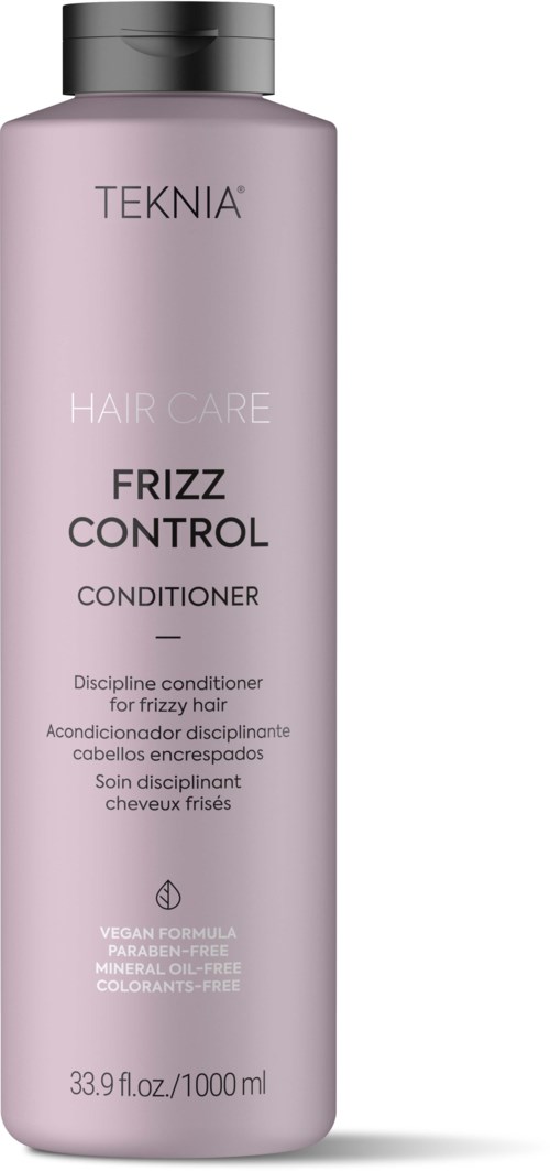 Een roze flesje van TEKNIA haarverzorging 'Frizz Control' voor krullend haar, veganistisch, zonder mineralen en kleurstoffen.