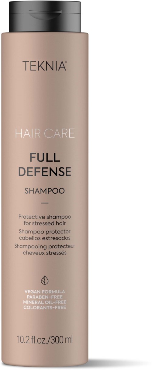 A beige bottle of Teknia Full Defense shampoo for stressed hair, free of parabens, dyes, and sulfates, 300 ml.