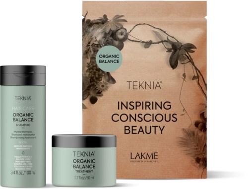 Een set biologische haarverzorgingsproducten met een doos die zegt "Inspiring Conscious Beauty" en "Organic Balance".
