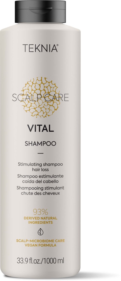 Valkoinen shampoopullo, jonka etiketissä lukee 'TEKNIA SCALP CARE VITAL', ja jossa on musta korkki, korostaa luonnollisia ainesosia ja päänahan terveyttä.