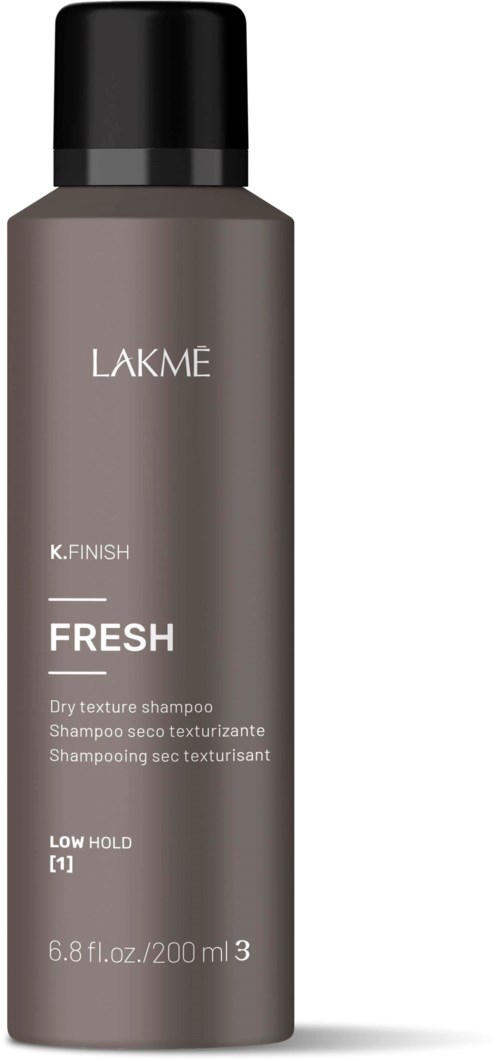 En grå flaska med Lakmé-schampo märkt 'Fresh' för torrt hår, med svart lock, 200 ml volym, och låg stadga.