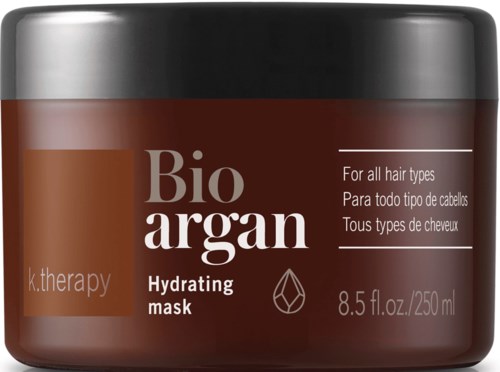 En brun krukke merket 'Bio Argan Hydrating Mask' for alle hårtyper, inneholder 8,5 unser (250 ml).