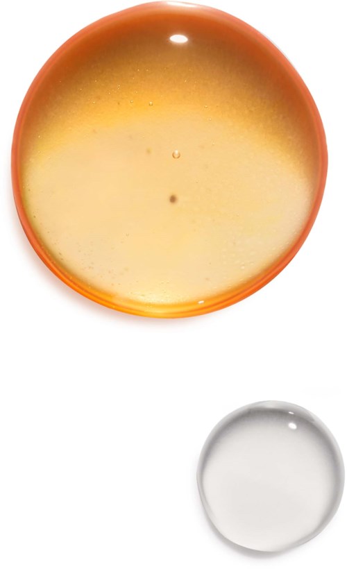 Twee kommen, een grote met gele-oranje binnenkant, een kleine met heldere witte voorgrond.