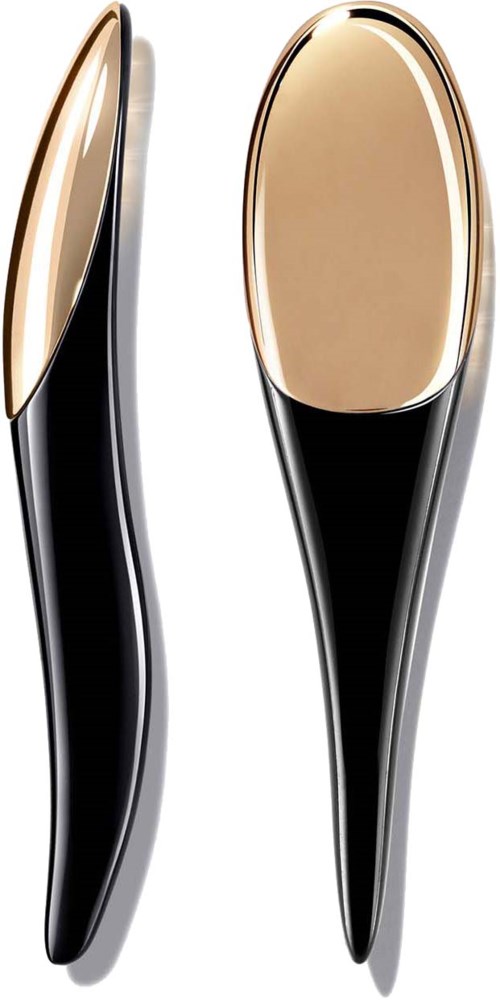 Two elegant makeup brushes with gold and black handles, one large and one small, designed for beauty care.