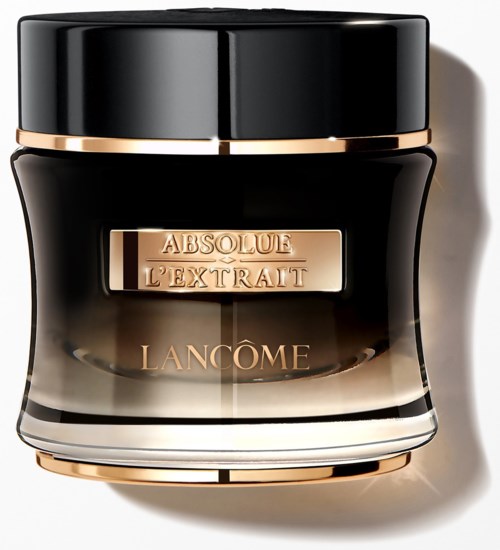 Ein schwarzer Behälter mit goldenen Akzenten und einem goldenen Etikett mit der Aufschrift 'Absolute L'Extrait' von Lancôme.