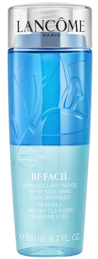 A blue cosmetic bottle with a silver cap, labeled 'Lancôme'. It is a quick, non-oily eye cleanser for sensitive eyes.