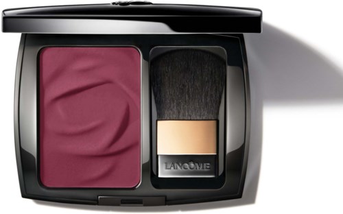 A makeup compact with pink blush and a black brush inside.