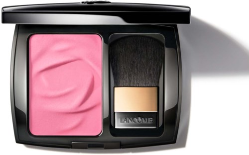 A makeup compact with pink blush and a large brush inside, no other items visible.