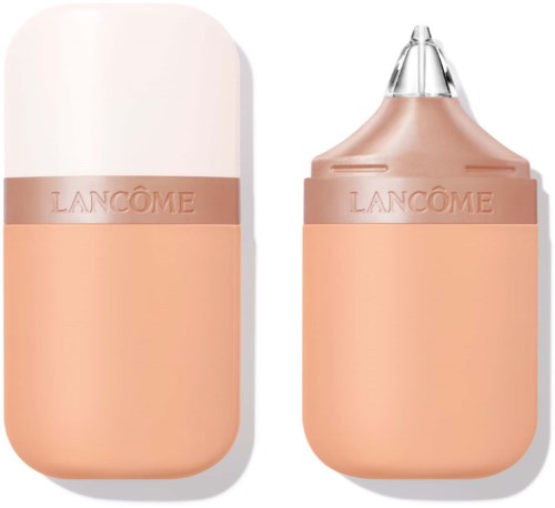 Lancôme cosmetic container with an applicator on the right. Pale pink color and brand name visible.