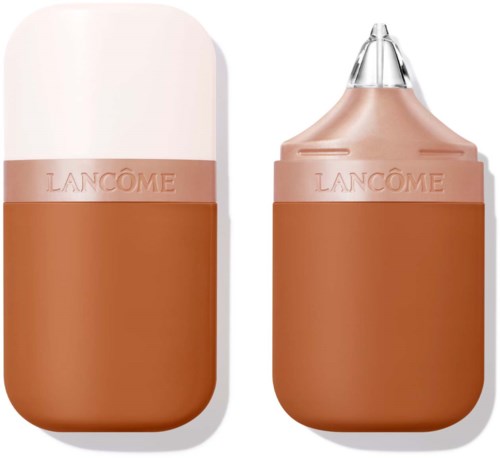 A peach-colored makeup stick with a clear top, labeled 'Lancôme,' showing both open and closed forms.