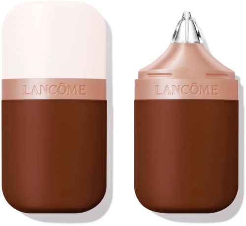A beige and brown makeup product with a removable lid and a pipette, labeled 'Lancôme.'