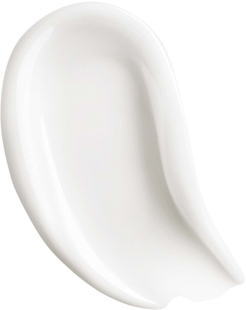 Een witte keramische schaal met een gebogen, schelprokachtige vorm en glad oppervlak.