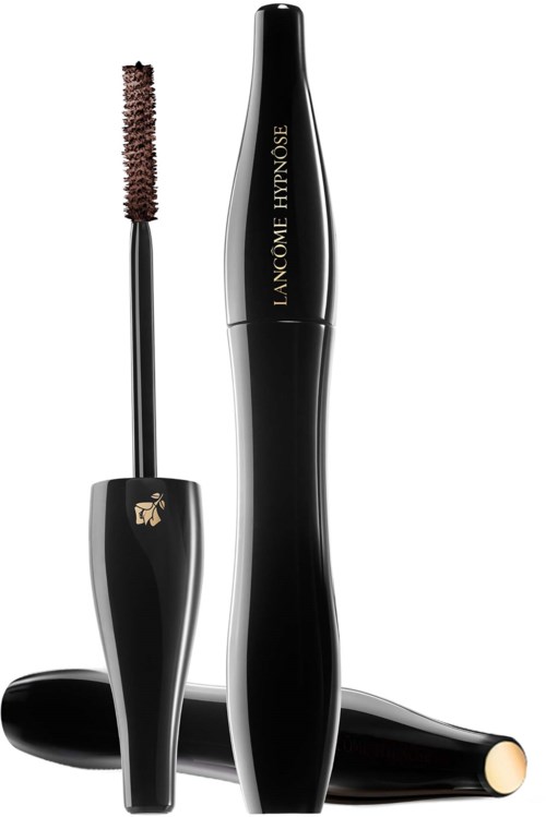 A black mascara tube with a wand next to it, and a second tube lying down, all with a sleek design.