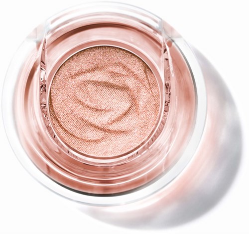 A close-up shows a pinkish, shimmery eye shadow in a small round container with a swirl pattern.