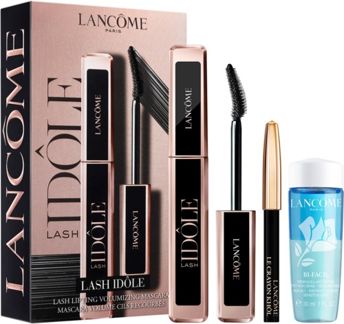 Lash lifting mascara, zwarte en gouden mascara tubes, en een kleine blauwe en witte huidverzorgingsfles.
