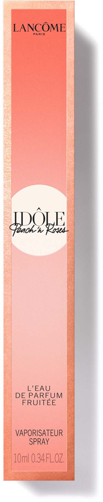 Eine lange, rosafarbene Parfümverpackung mit schwarzem und weißem Text, die den Duft 'Idôle' von Lancôme anzeigt und ihn als fruchtig beschreibt.