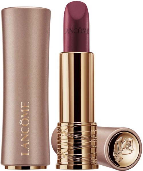 Ein Lippenstift in einem goldenen und rosa Etui, Flasche und Kappe separat.
