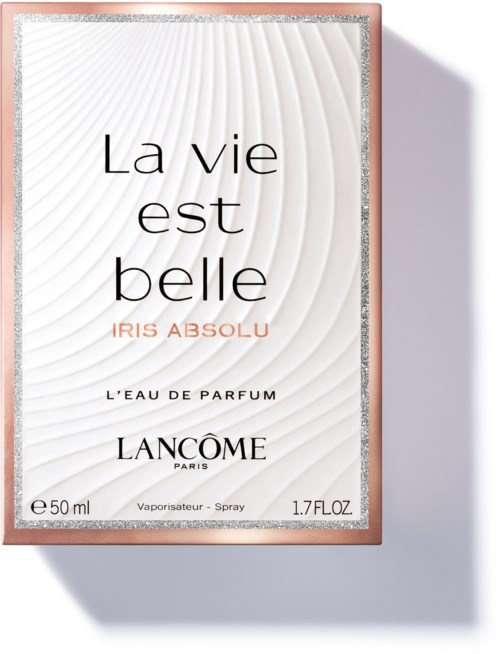 En parfyllåda med texten 'La vie est belle Iris Absolu' i vita och rosa färger, med produktbeskrivning.