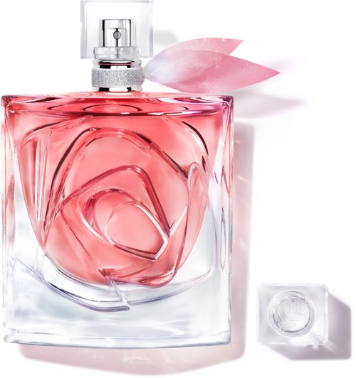 A perfume bottle with pink liquid, flower-shaped cap, and pink petals attached to the top.