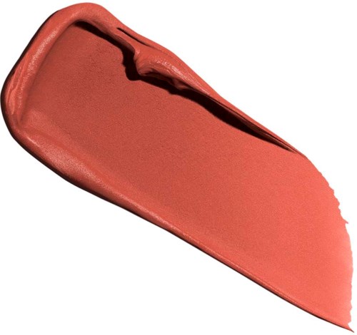 A peach-colored lipstick with a smooth, rounded edge and a slightly open tip.