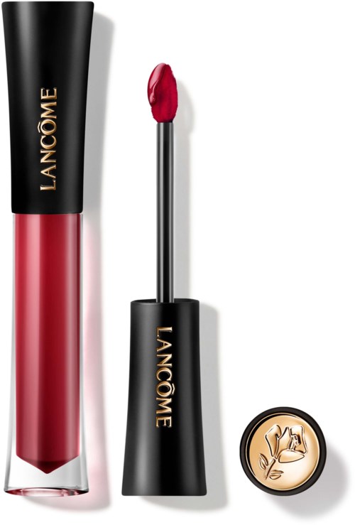 Lancôme lipstick in a black tube, with a red lipstick swatch and a gold-colored floral emblem container.