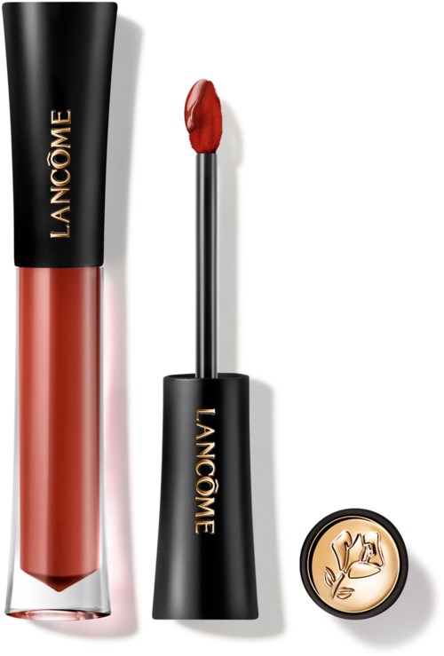 Lip gloss tube, applicator with red gloss, and small round lip gloss container with a flower design.