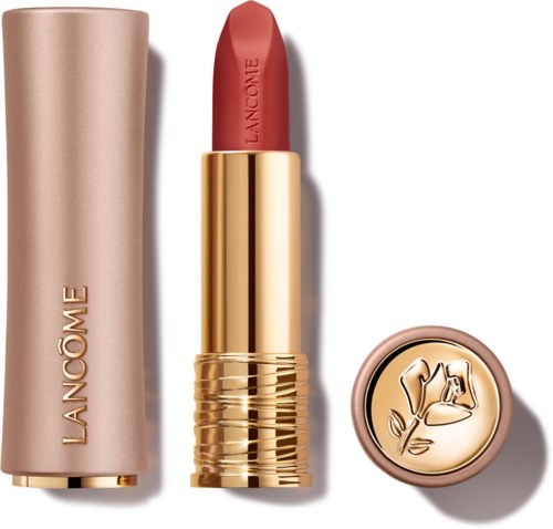 Lancôme huuli, jossa on kultainen kotelo ja vaaleanpunainen kärki, ruusukuviossa korkissa.