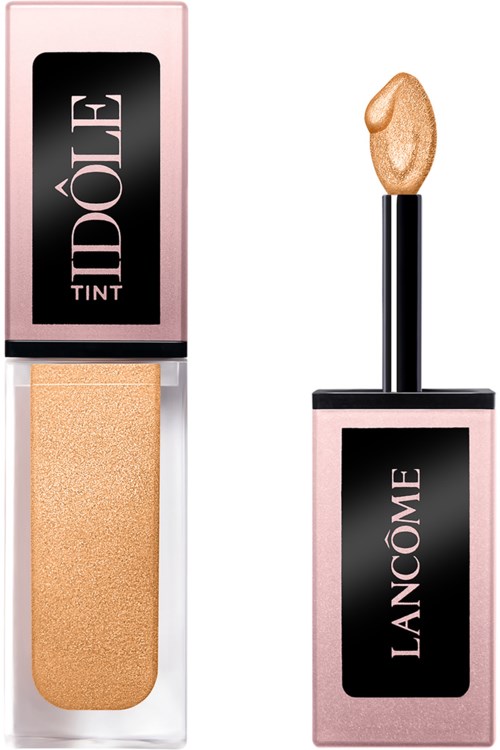 Ein Make-up-Korrekturstift mit pink-schwarzer Verpackung und beige Schwamm.