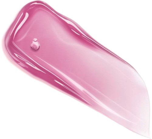 A pink gel or cream spread on a surface with some shiny reflections and a small bubble.