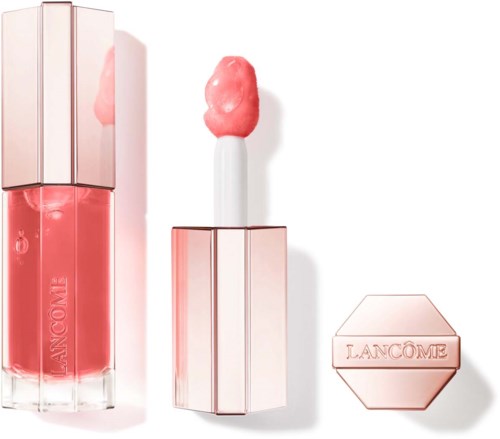 Ein rosa Lippenstiftbeh 000000003ter, Lippenstift darin, und eine kleine sechseckige Box mit dem Wort 'Lanc 6me'.