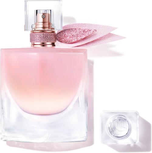 Een roze parfumfles met spray, roze lint en een helder blok. Elegante en luxueuze stijl.