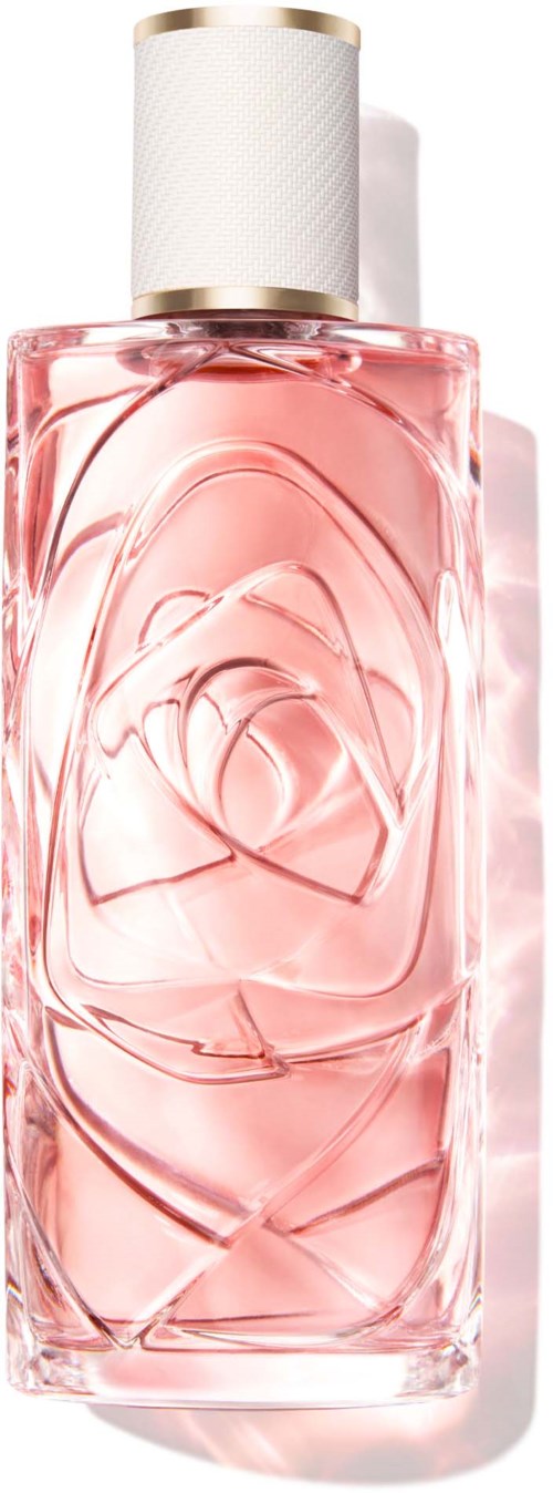 Eine rosa Parfümflasche mit weißen Deckel, verziert mit Rosenmuster. Sie steht senkrecht und sieht elegant aus.