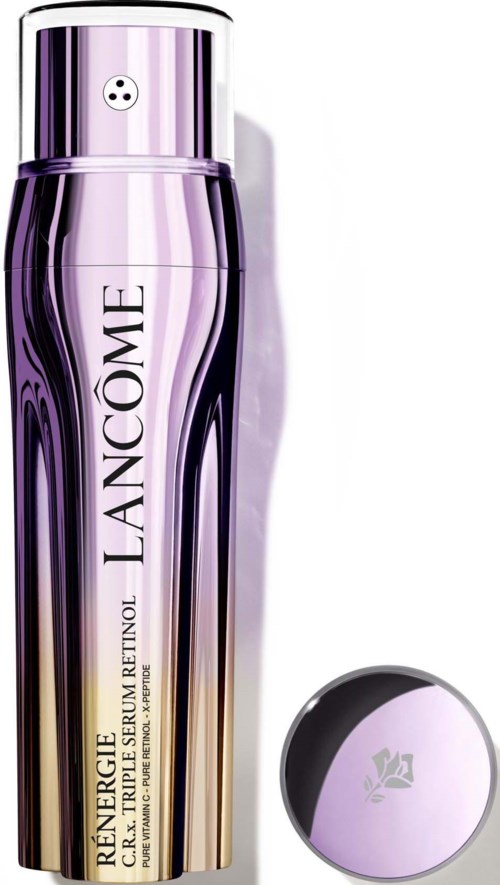 Eine lila-silberne Flasche mit Hautpflegeprodukt von Lancôme und rundem Deckel.